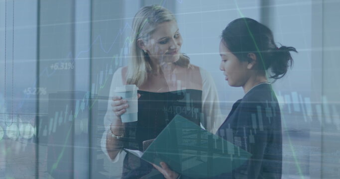 Image of financial data processing over diverse businesswomen