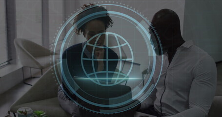 Image of cyber security text, globe icon, diverse colleagues discussing over laptop in office