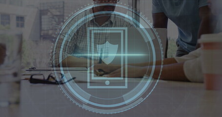 Image of cyber security text and shield icon, diverse coworker analyzing sales report in meeting
