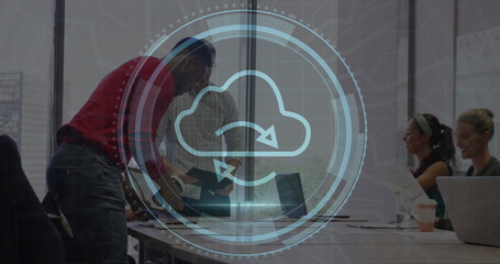 Image of cyber security text and cloud icon over diverse colleagues sitting in conference room