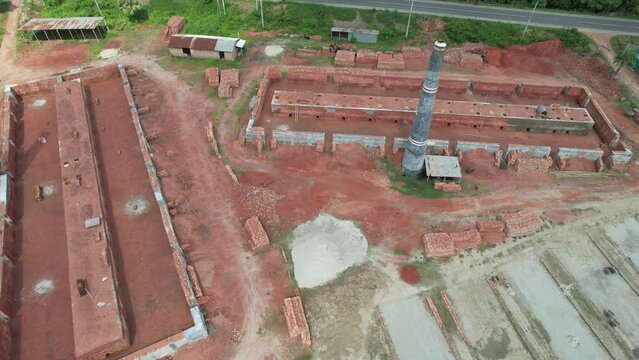 Aerial drone video of a brick kiln in Bangladesh where the raw clay is baked into bricks and stones