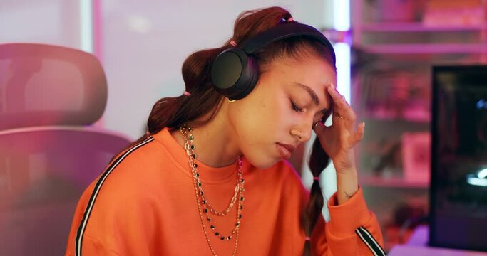 Home, gaming and woman with headache, tired and mistake with loser and fatigue with screen. Person, gamer or girl with headphones or migraine with pain and challenge with computer, burnout or mistake