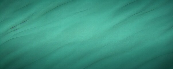 Mint Green background with subtle grain texture for elegant design, top view. Marokee velvet fabric backdrop with space for text or logo
