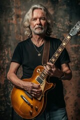 Obraz premium Confident musician holding a guitar