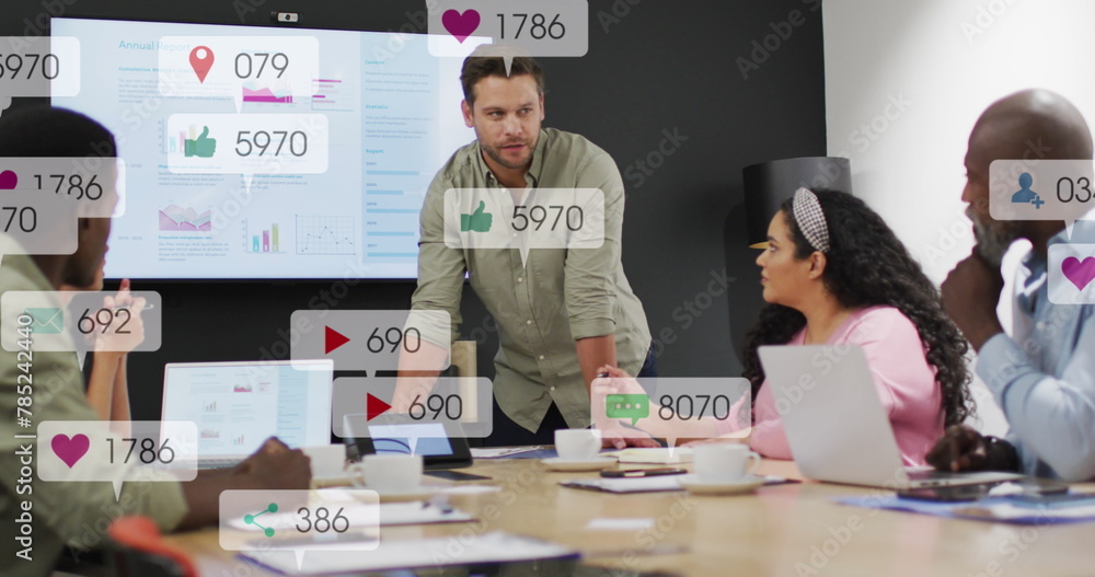 Poster image of multiple notification bars over diverse coworkers discussing reports in office