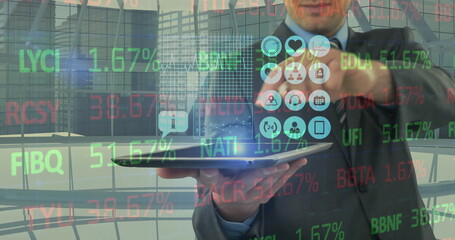 Image of digital icons and financial data processing over businessman holding tablet