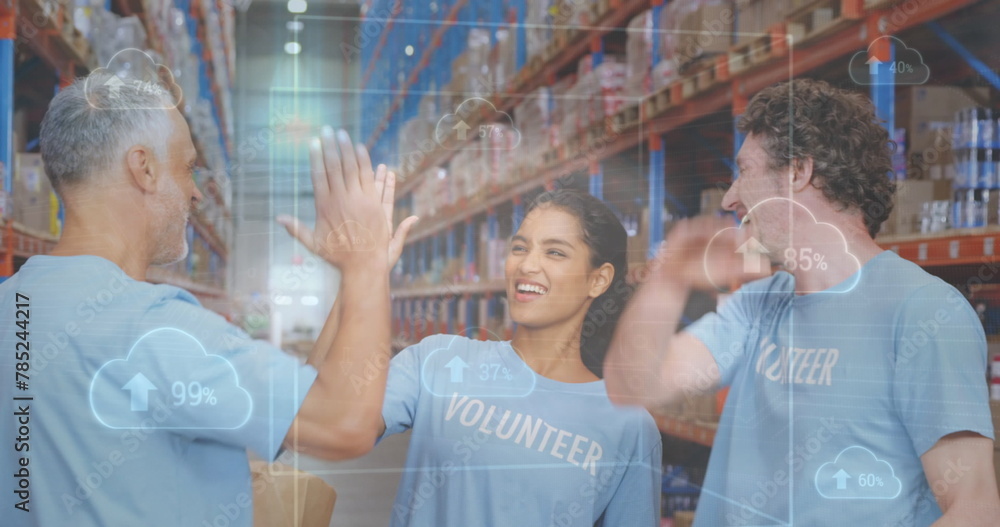 Poster image of clouds and data processing over diverse volunteers high fiving in warehouse