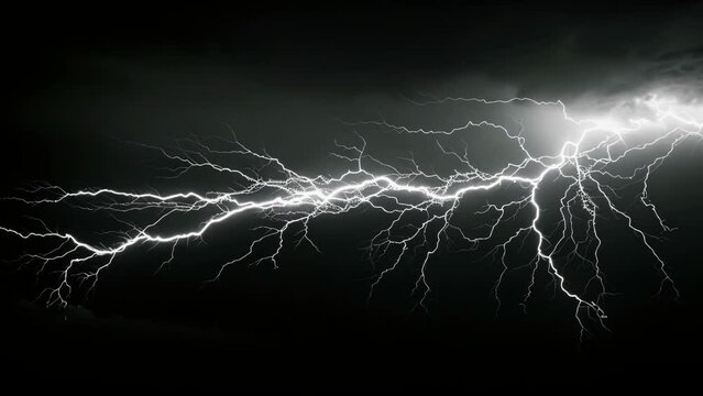 Lighting bolt striking at night sky background. Terrible lightning in a storm. Bad weather. Electrical spark discharge in atmosphere during thunderstorm. Bright flash of light and accompanying thunder