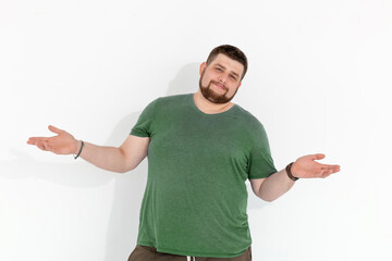 european fat young man emotions of pain on white background