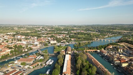 Obraz premium Beautiful panoramic view from a drone of the city of Peschiera del Garda province of Verona in Veneto.