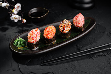 Gourmet sushi selection on elegant dark table