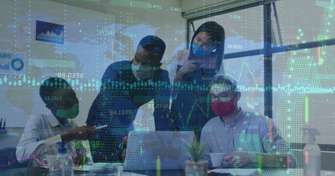 Data processing against diverse office colleagues wearing face masks discussing at office