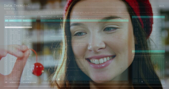 Image of data processing against close up of a caucasian woman holding a cherry - Powered by Adobe