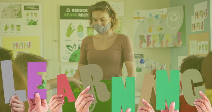 Image of learning text over caucasian teacher with diverse schoolchildren segregating waste - Powered by Adobe