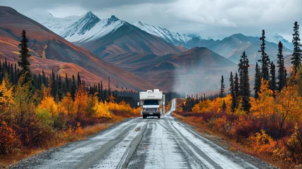 Fototapete Rund An RV on a deserted road in a colorful autumn landscape © Anas