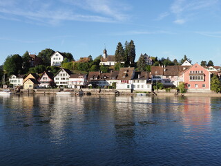 Fototapeta na wymiar Mansions at Rhine River in European STEIN AM RHEIN town in SWITZERLAND