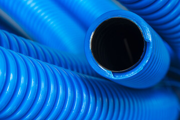 Corrugated pipe for electrical installation close-up - 785274634