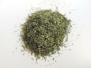 Dried dill on bright background.