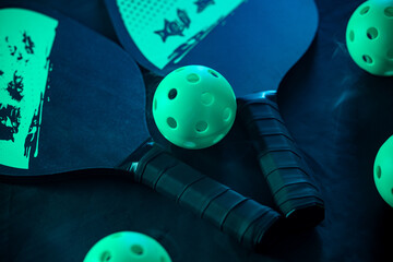 Pickleball game set. Rackets and balls on the court. Copy space. Sports background. - 785282292