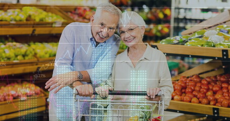 Image of financial data and graphs over happy senior caucasian couple in market