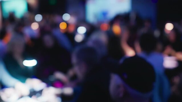 Immerse yourself in the excitement of trivia night at a popular bar, where friends gather to play addictive quiz games and have a great time