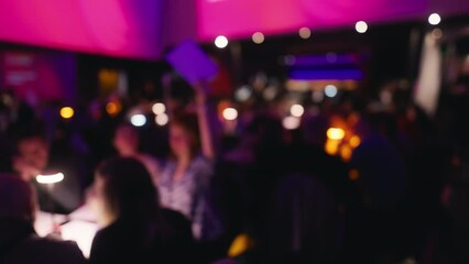 Indulge in the delight of bar trivia as friends gather to enjoy drinks and test their knowledge in a lively atmosphere