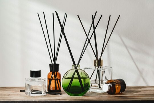Collection Aromatic Reed Diffusers Wooden Table Against Neutral Background