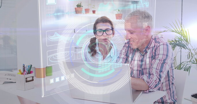 Image of data processing over caucasian male ad female fashion designers discussing at office