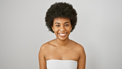 African american woman with curly hair smiling isolated on white background