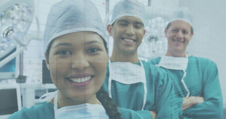 Image of data processing over diverse male and female surgeons in hospital