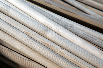 A close up of a stack of curved wood