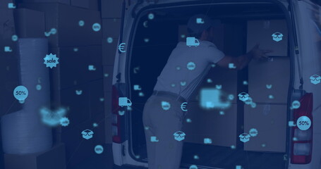 Image of digital icons floating over a caucasian delivery man packing boxes into a car
