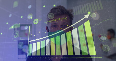 Covid 19 statistical data processing against man adjusting his face mask at office