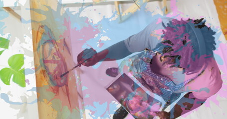 Obraz premium Image of pink and blue paint over artist painting picture