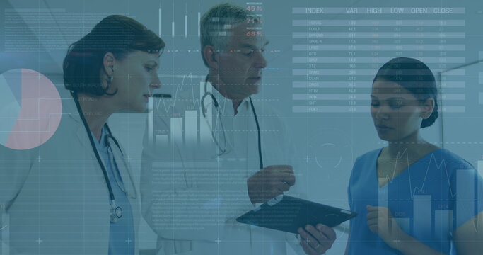 Image of graphs and data over diverse female and male doctors during consultation