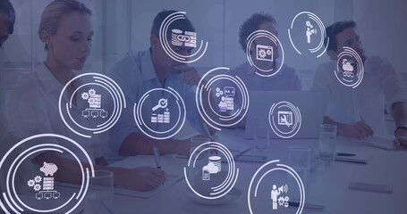 Image of network of digital icons over diverse business people