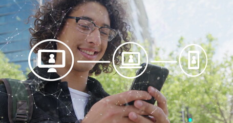 Image of digital icons and network of connections over biracial man using smartphone on street