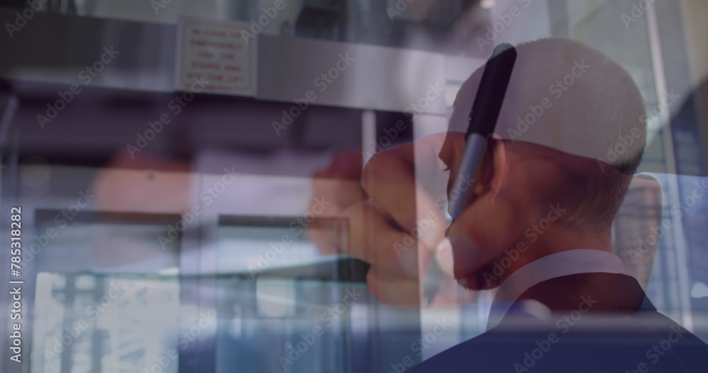 Poster Image of caucasian businessman walking over hands writing