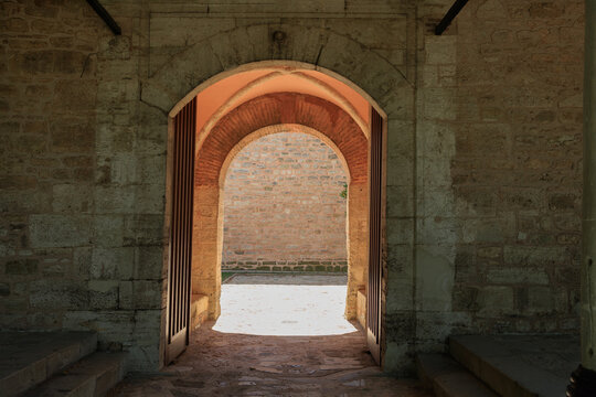 aged, ancient, antique, arch, arched, arches, architecture, archway, brick, carve, castle, church, courtyard gate, decor, door knocker, doors, doors and arches, doorway, entrance, facade building, fen