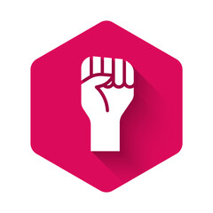 White Raised hand with clenched fist icon isolated with long shadow. Protester raised fist at a political demonstration. Empowerment. Pink hexagon button. Vector