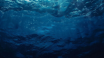 Dark blue ocean surface seen from underwater - obrazy, fototapety, plakaty