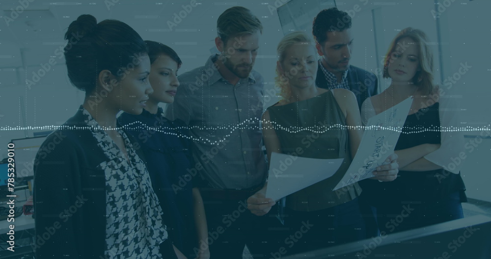 Poster image of data processing over diverse team of colleagues reading documents together at office