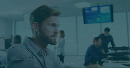 Image of financial data processing over caucasian man talking on phone at office