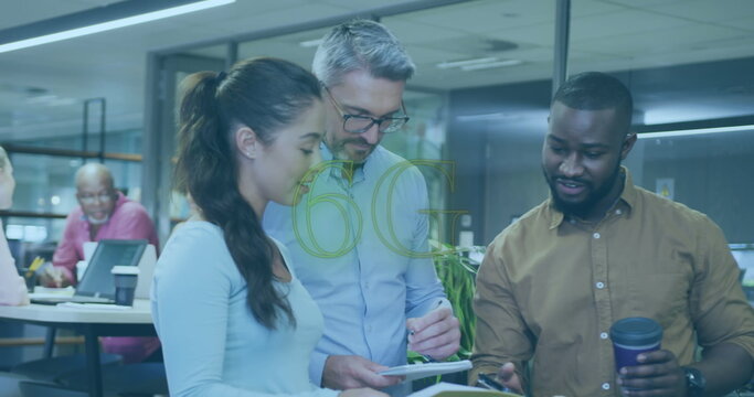Image of 6g text over diverse business people working at office