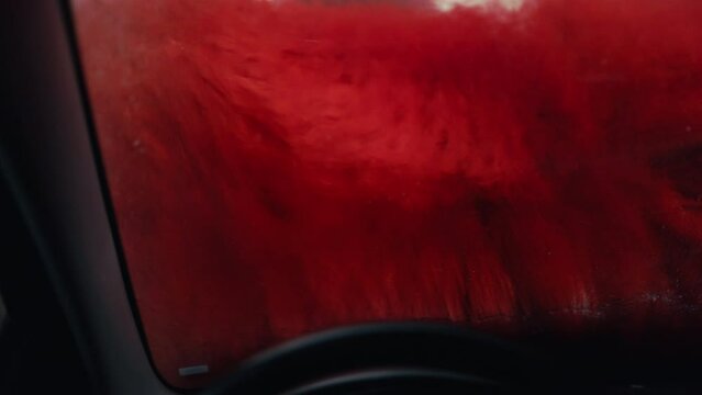 Foam Cascade: Watch in awe as your car is bathed in a sea of suds during an automatic car wash, filmed from inside to showcase every moment of the cleansing process.