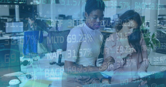 Image of financial data processing over diverse business people in office