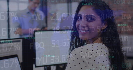Image of stock market data processing over indian woman using computer at office