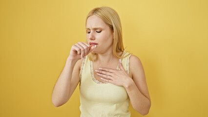 A blonde woman coughing and feeling unwell against a yellow background, depicting sickness or...