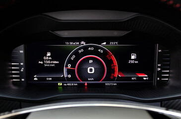 Sports car digital speedometer and tachometer. Sports car dashboard. Close-up view of the modern car dashboard. Arrow of speedometer of supercar.