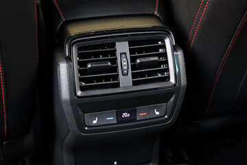 Fototapeta premium Climate control for rear passengers. Conditioner dashboard display.